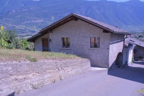 Mazot Valaisan amid vineyards.