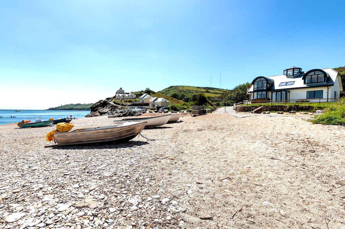 Propiedad de Airbnb exitosa: Beach front + 100 yard to Beach + Hill view+Garden en Stokenham