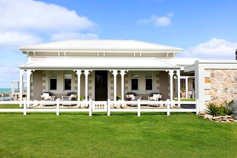 Historic Harbour Masters House right on the beach