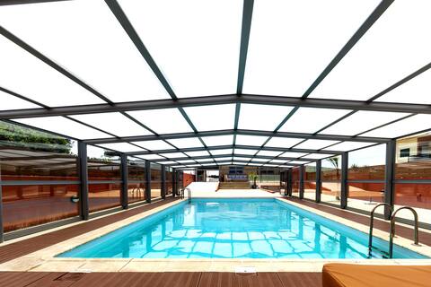 House with heated pool all year round.