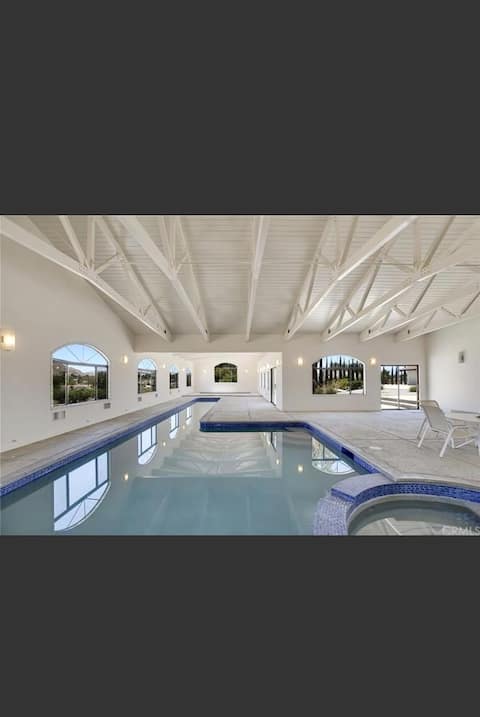 Oasis indoor swimming pool & very spacious home.