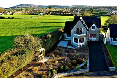 House by Lough Derg & Mountains