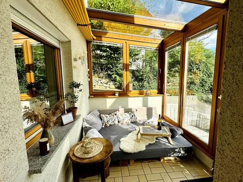 In-law with cozy conservatory