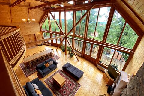 Carpathian Log Home, stunning glass wall chalet