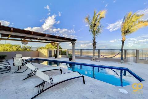 Beachfront Paradise: Pool, BBQ, & Bay Views