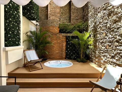 Jacuzzi inside colonial ruins in beautiful apartme