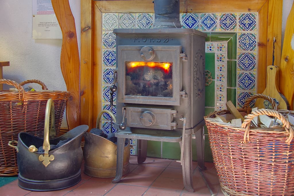 Our cosy stove with logs provided