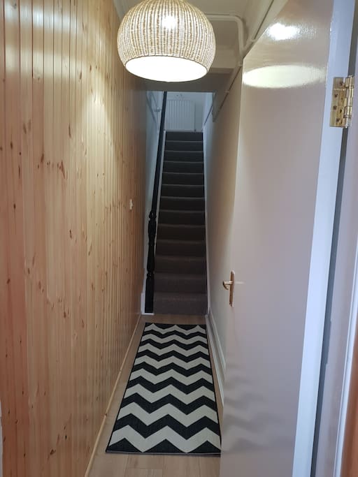 Light and airy hallway with a Chevron feel.
