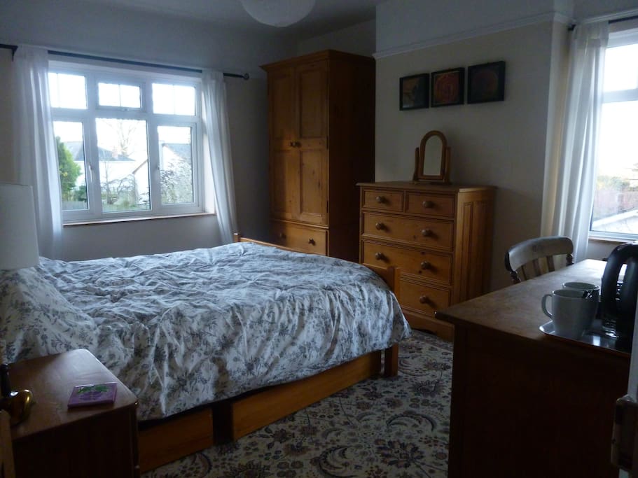 Large airy double room with windows facing south and west.