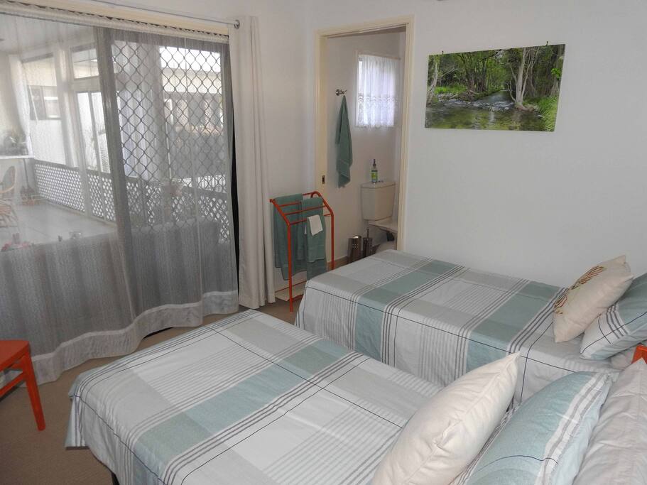 The "Shannonvale" Bedroom boasts 2 single beds with shared en-suite with bedroom 2. This bedroom looks out onto the enclosed patio