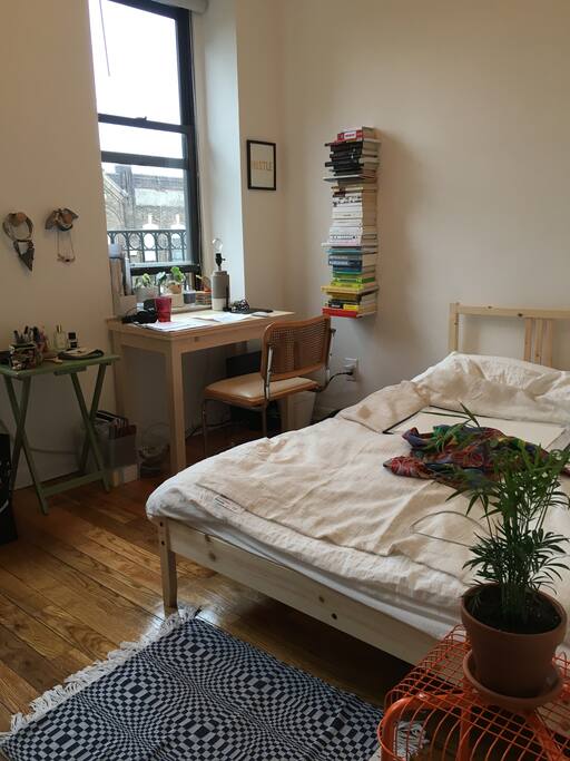 Bedroom with lots of sunlight