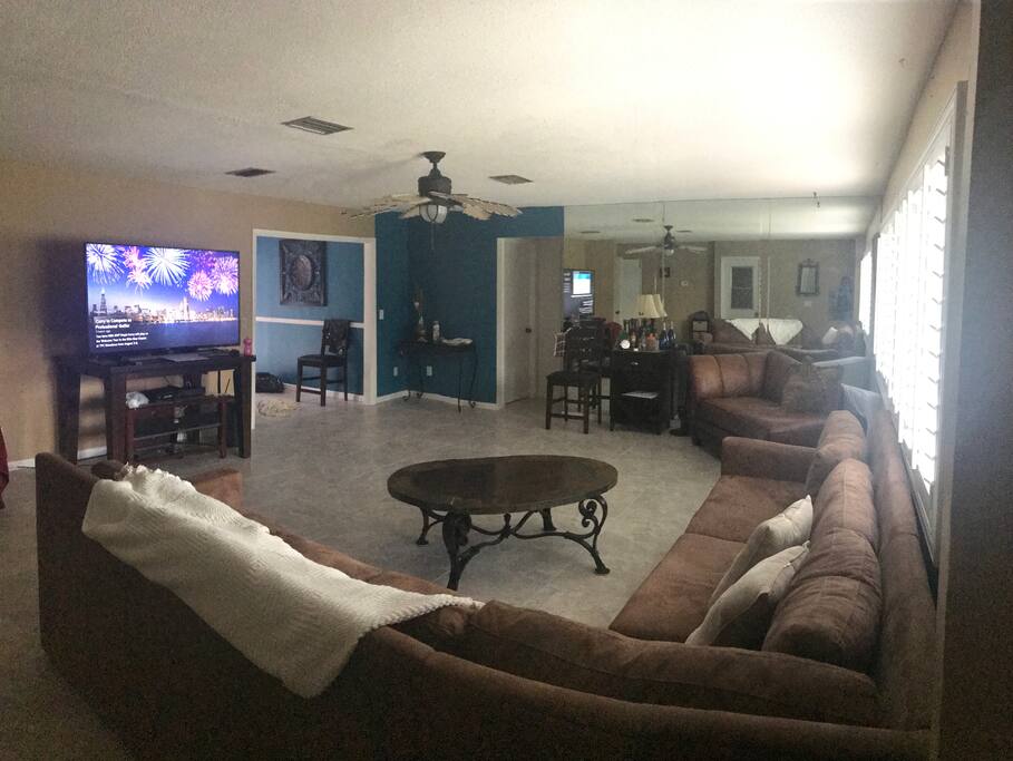 Family living room. Extremely spacious with plenty of seating. Sofa is fairly new.