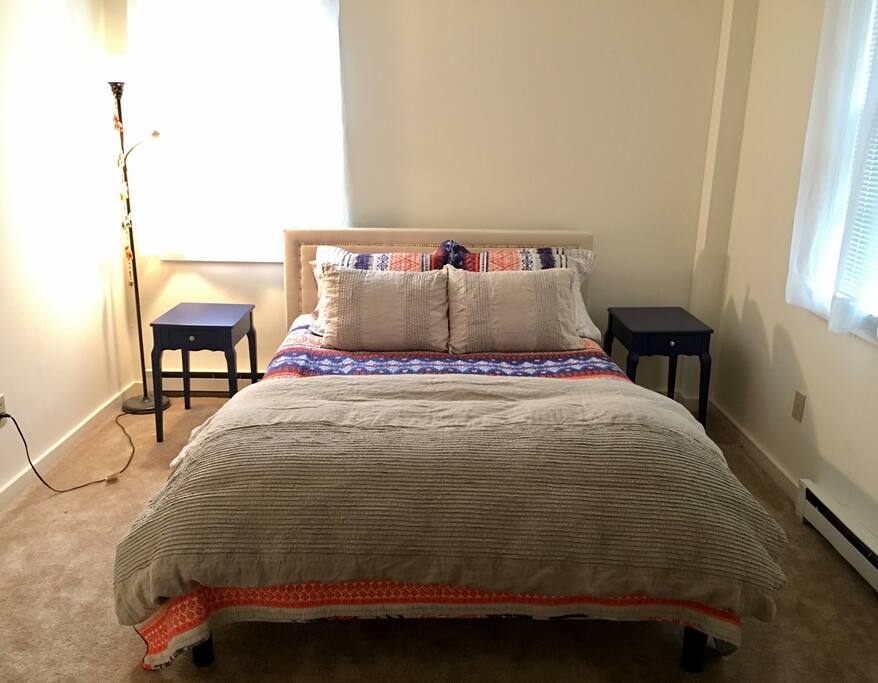 Private bedroom with queen-size bed.