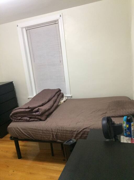 Spacious Private Bedroom with Nightstand