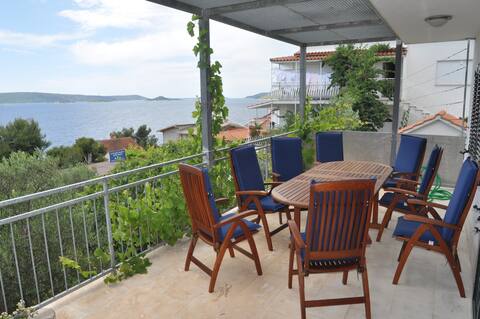 Holiday home with panoramic terrace and beach place