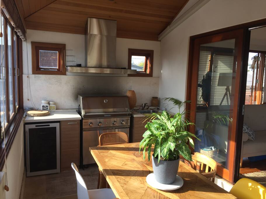 Indoor BBQ and wine fridge.
