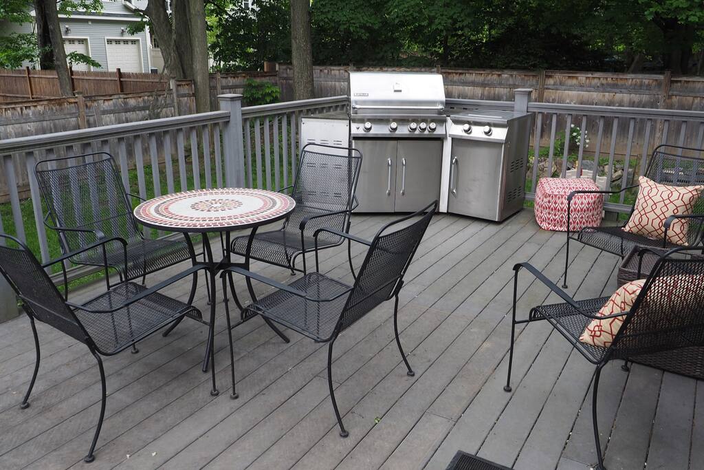Back Deck, Grill, Dining and Seating. Fenced in yard for privacy.