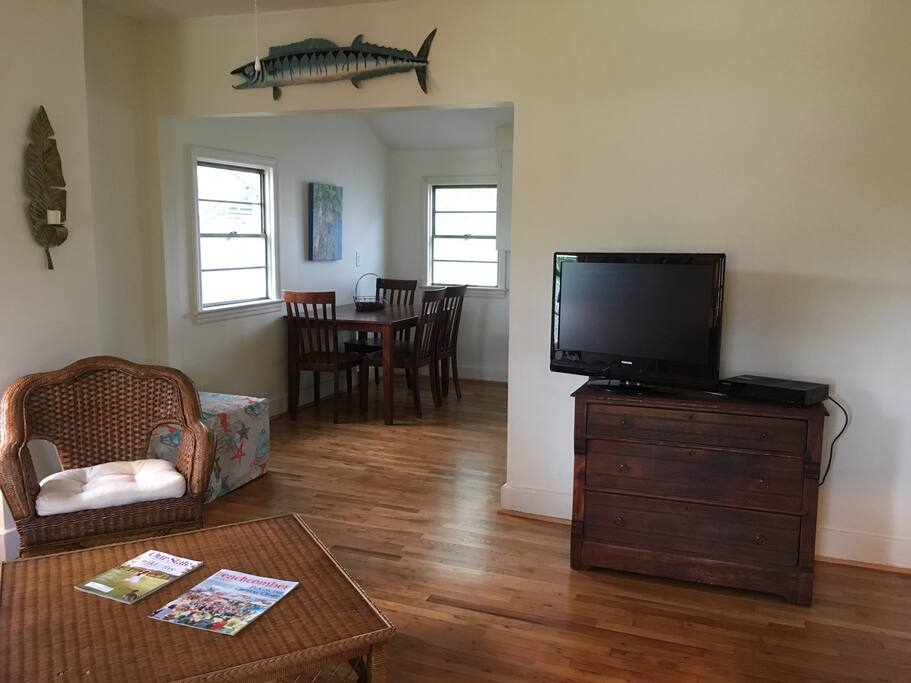Living room with view of dining area.