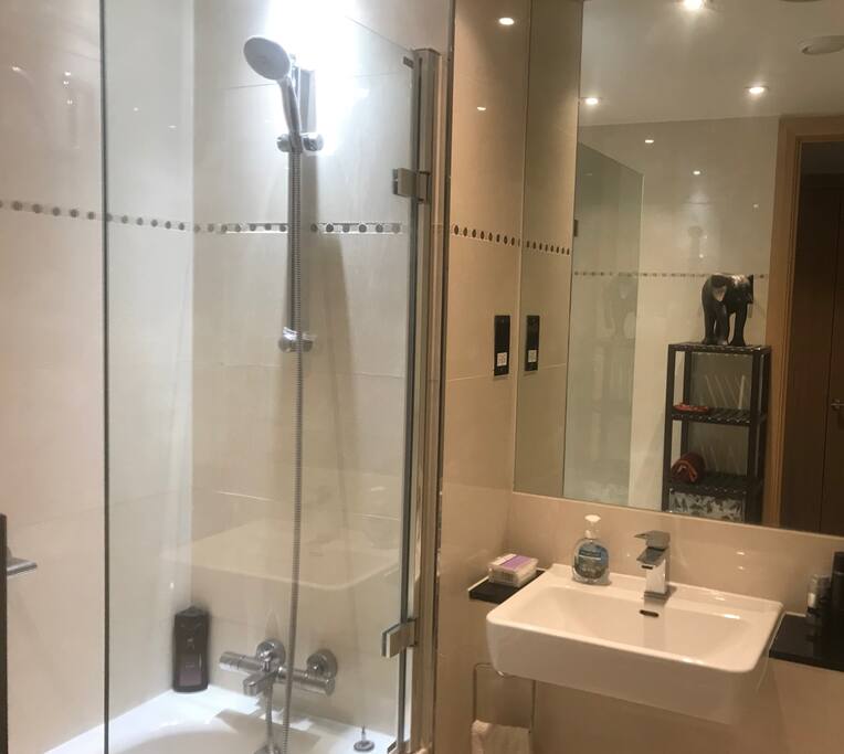 bathroom with linens available