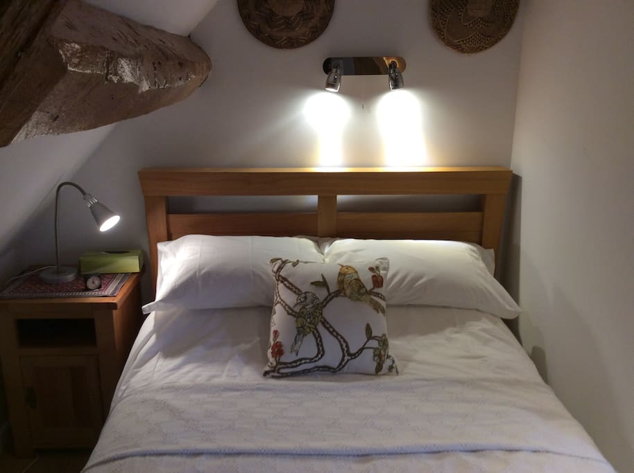 Comfortable double bed with reading lights