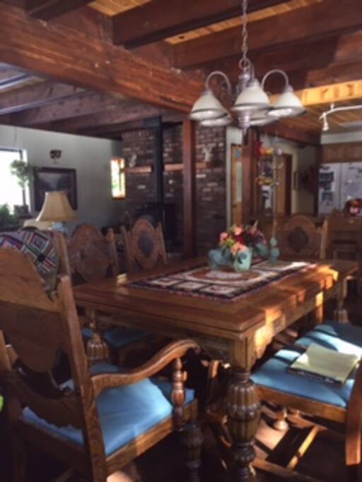 Large dining table plus bar for lots of seating.