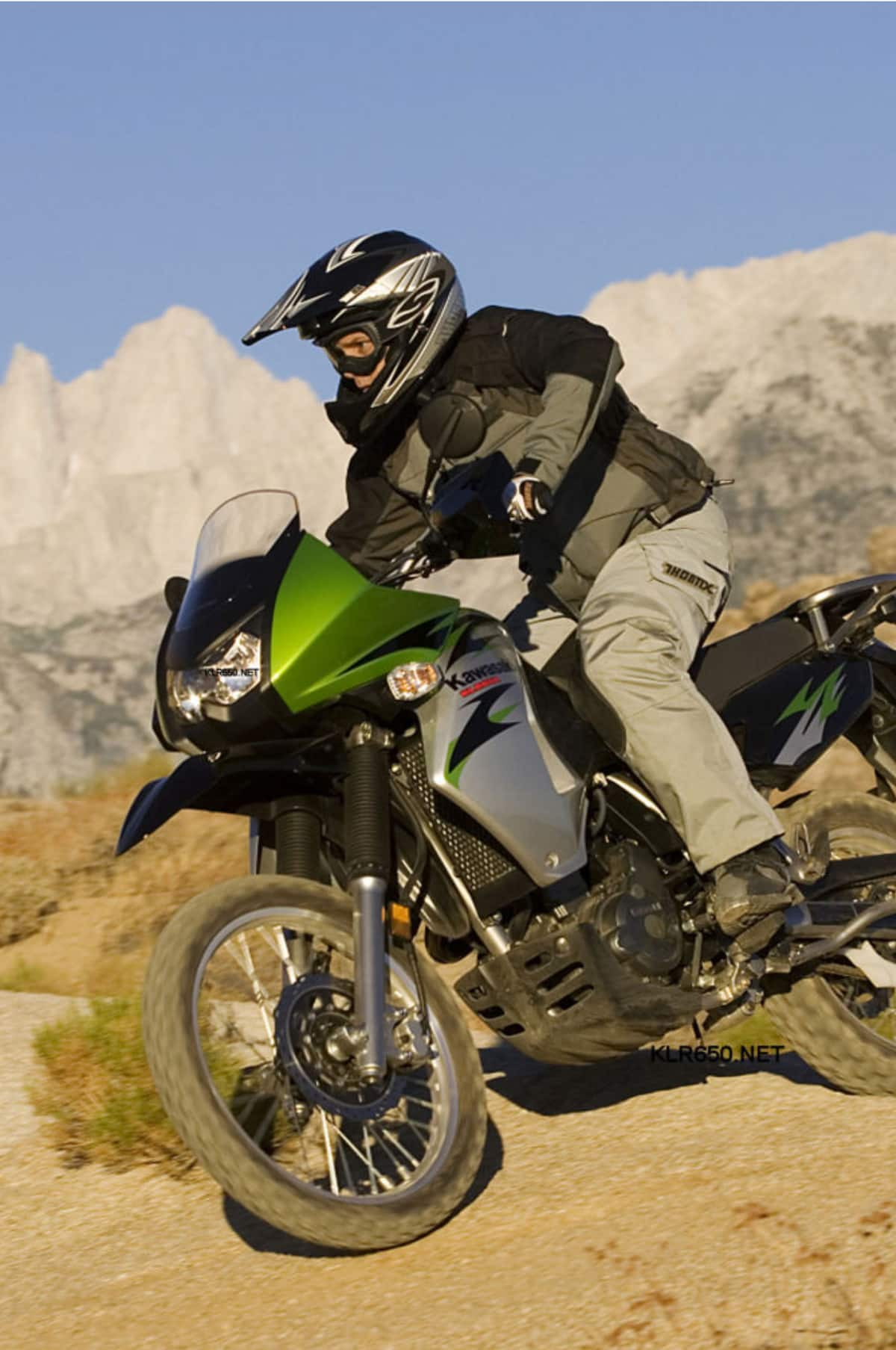 Man on motorcycle in desert