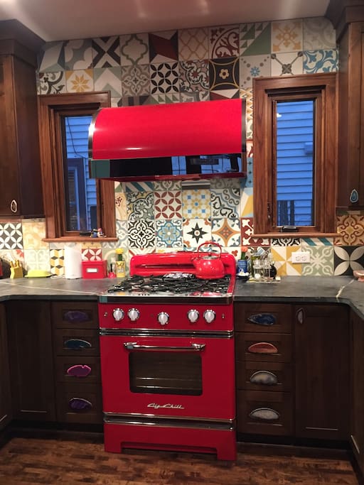 Kitchen focal point, with new retro range and hood for cooking up a storm.