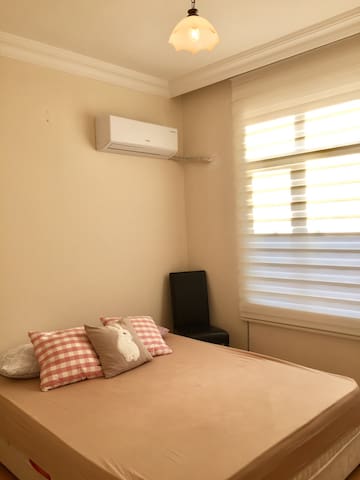 Simple room with double bed++air conditioner