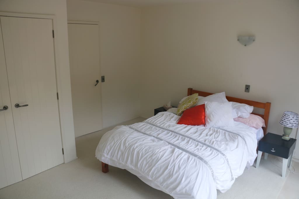 Large bedroom, with double bed and built in wardrobe. Private courtyard.