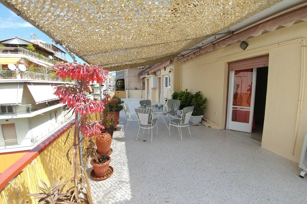 The huge balcony is ideal for relaxing and enjoying the summer breeze!