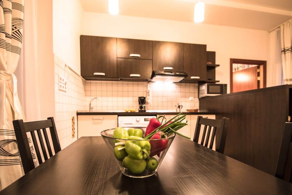 Dining area for 4, with open-space kitchen
