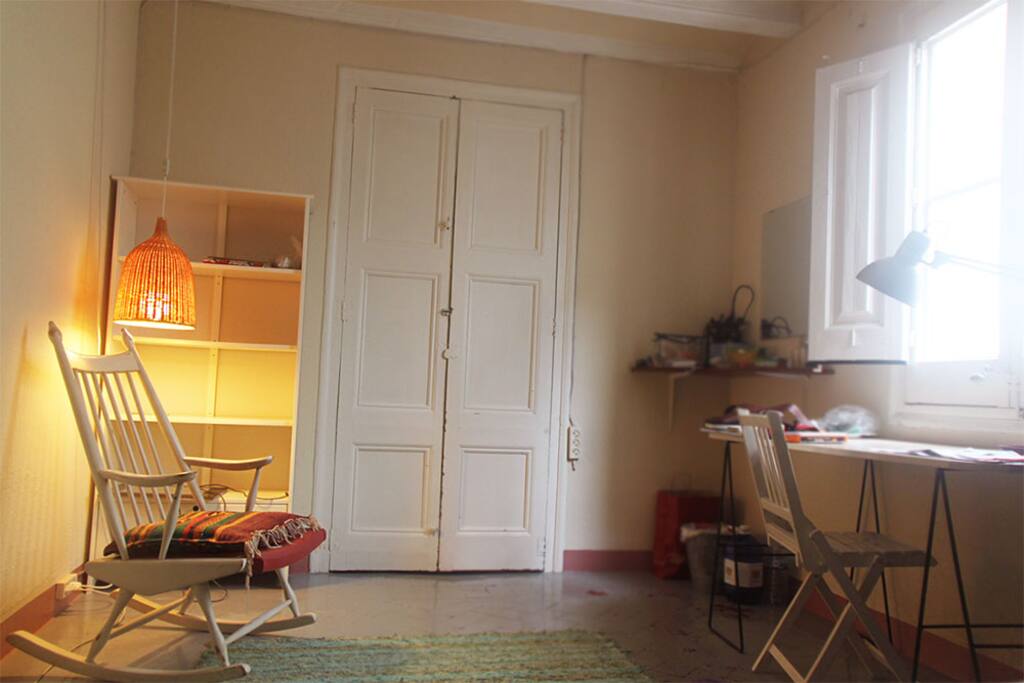 with writing table and big window