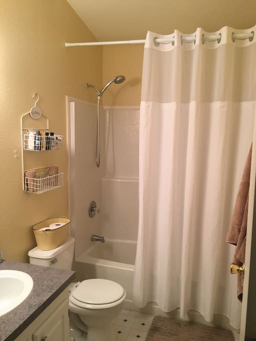 Private bath with shower and tub. All towels and toiletries included.