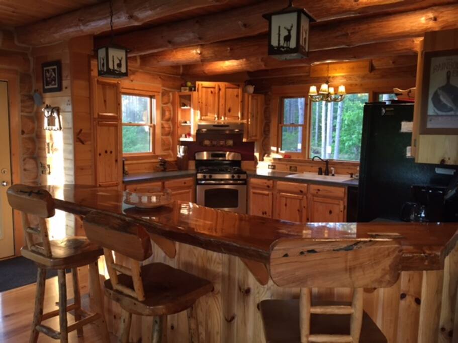 The bar counter overlooking the gourmet kitchen.