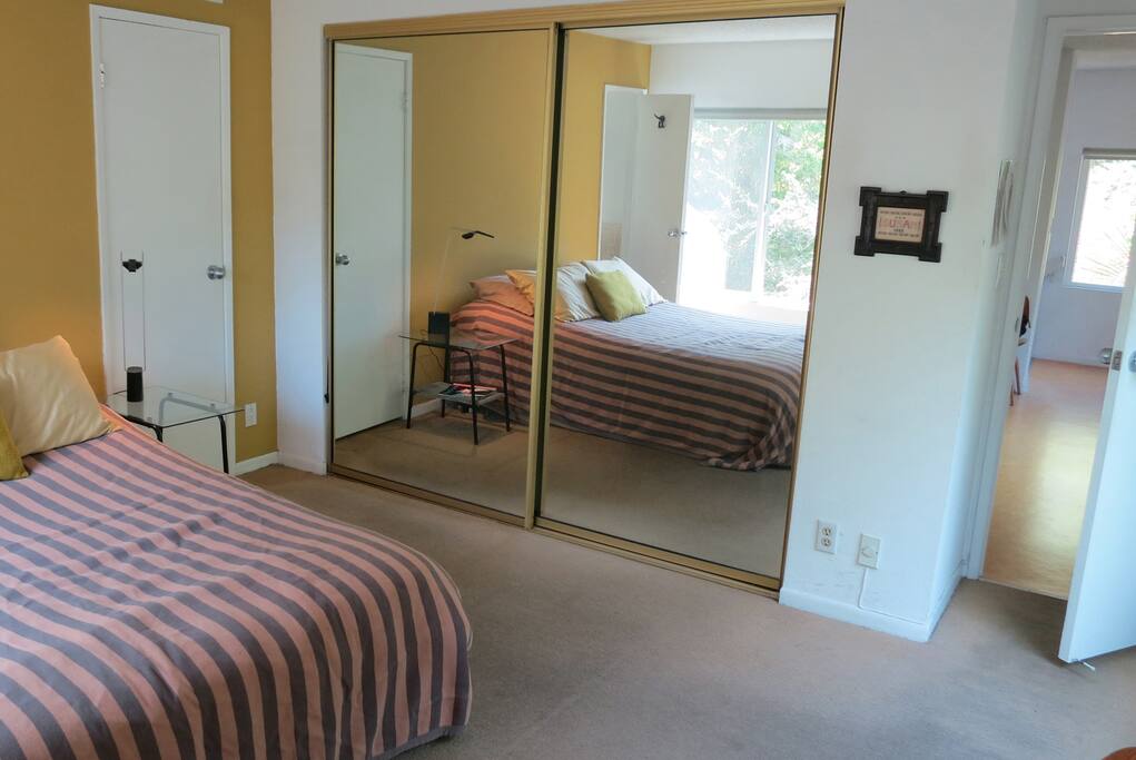 Master Bedroom with Mirrored Closet