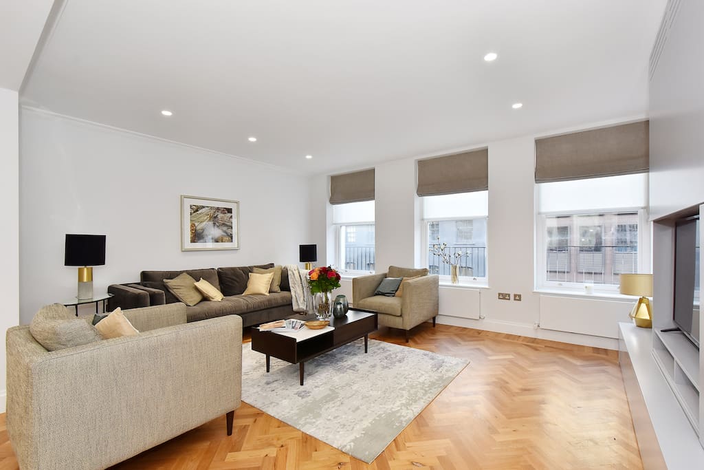 The elegant newly furnished Lounge with large sofa and 2 armchairs