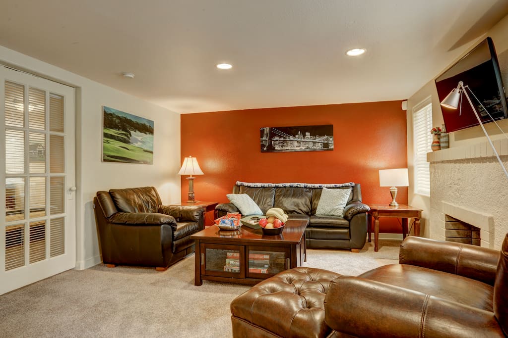 The conversation group is arranged around a huge coffee table, perfect for arguing over your favorite board games (tucked inside for your convenience!) and a 40" flat screen TV with extended cable and premium channels.