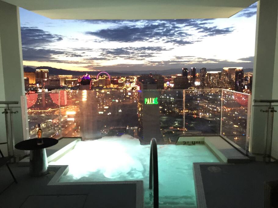 Your own privet jacuzzi hanging out of the building