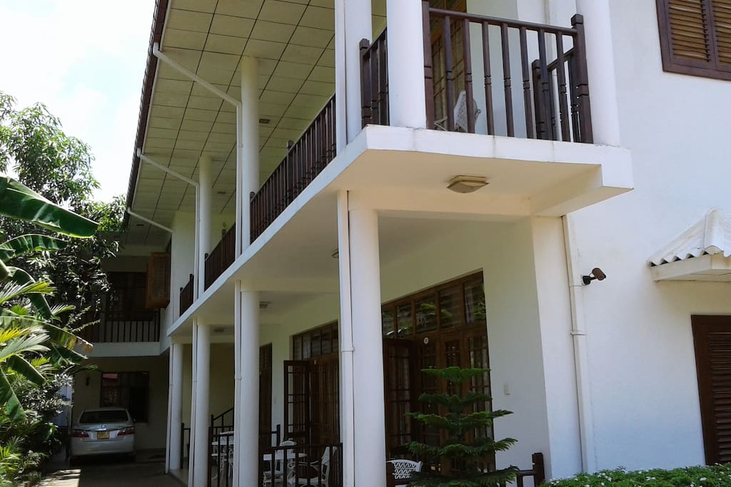upper floor rooms have balconies and lower ground floors also have seating areas outside