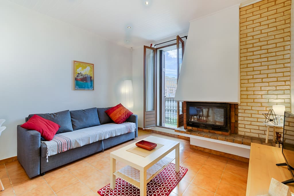 Spacious living room with couch bed for two
