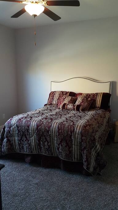 Bedroom #3 with queen size bed on the first floor.