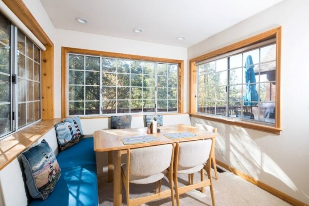 From the comfort of your breakfast room you’ll enjoy a three-sided vista of tree-shaded vistas and enjoy the (seasonal) burbling of a mountain stream only a few yards away. On the spacious deck you’ll be able to relax, barbecue, and watch the birds as they hop from branch to branch almost at your side.