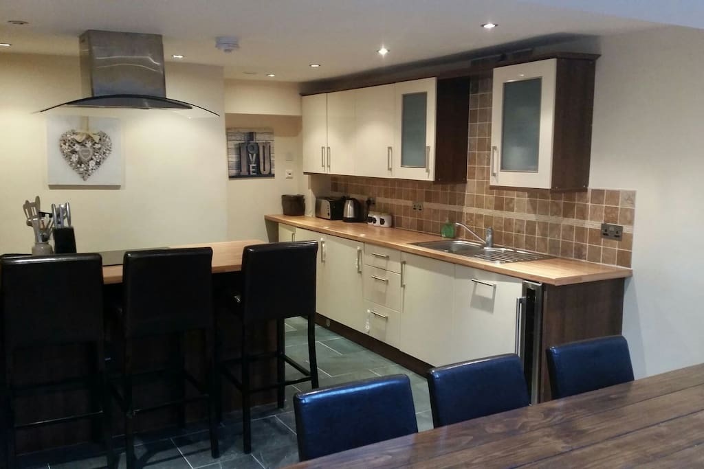 Kitchen area with breakfast bar