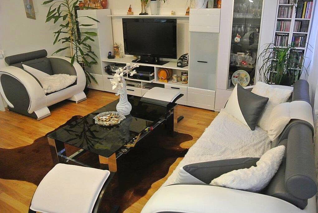 Living room with cozy seating, Home Entertainment and PayTV