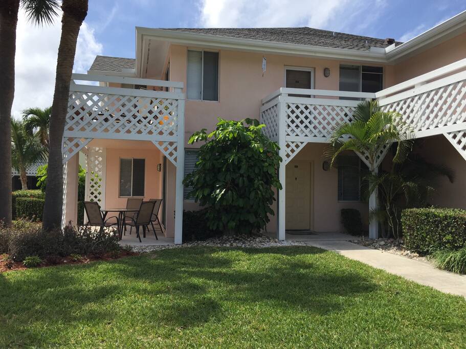 Our ground floor villa with patio and large lawn area.