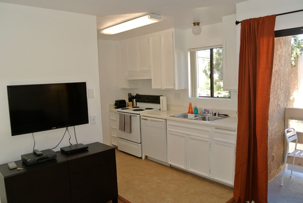 open concept living room looking into kitchen