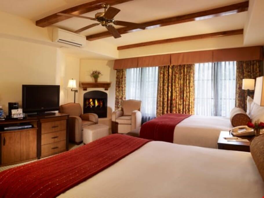 Get a good night's sleep in the cozy Deluxe room.