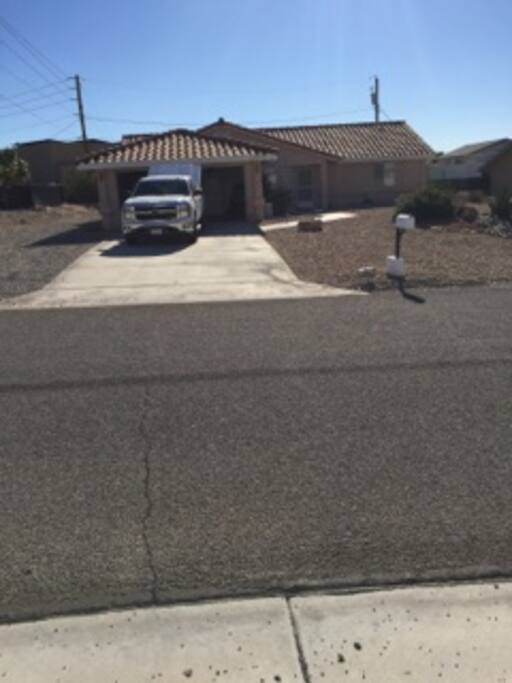 Deep garage for a decent size boat, RV parking on the side.