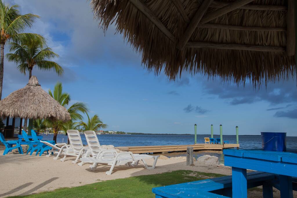 Beach tiki huts and chairs