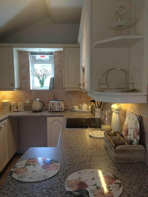 Country kitchen with hand painted units.